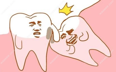 阻生智齿是需要拔除的www.waasee.com